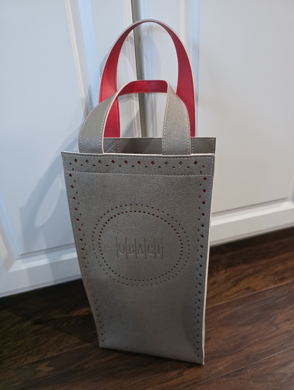 Obagi Gold & Red Perforated Wine Tote Bag